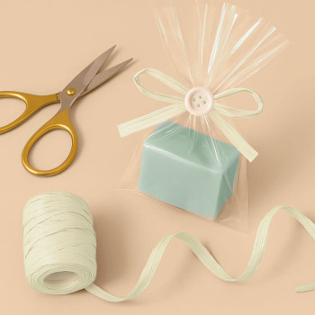 Elfenbeinfarbenes Raffiaband für Verpackungen und Geschenke. Online-Verkauf