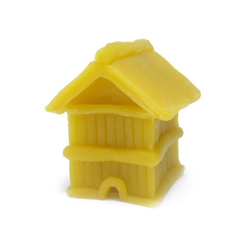 Form für hausgemachten Bienenwachskerzen in Form eines Hauses.