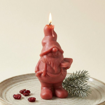 Silikonform Elf mit Buch zum Herstellen von Weihnachtskerzen.